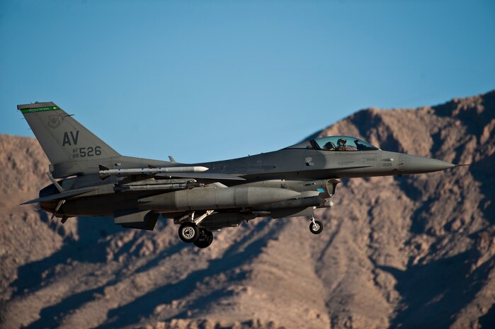 An F-16 Fighting Falcon assigned to the 555th Fighter Squadron, Aviano Air Base, Italy, approaches the runway for landing during Red Flag 15-1 at Nellis Air Force Base, Nev., Feb. 5, 2015. Red Flag exercises provide a series of intense scenarios for aircrew and ground personnel to increase their combat readiness and effectiveness for future real-world missions. (U.S. Air Force photo by Staff Sgt. Siuta B. Ika)