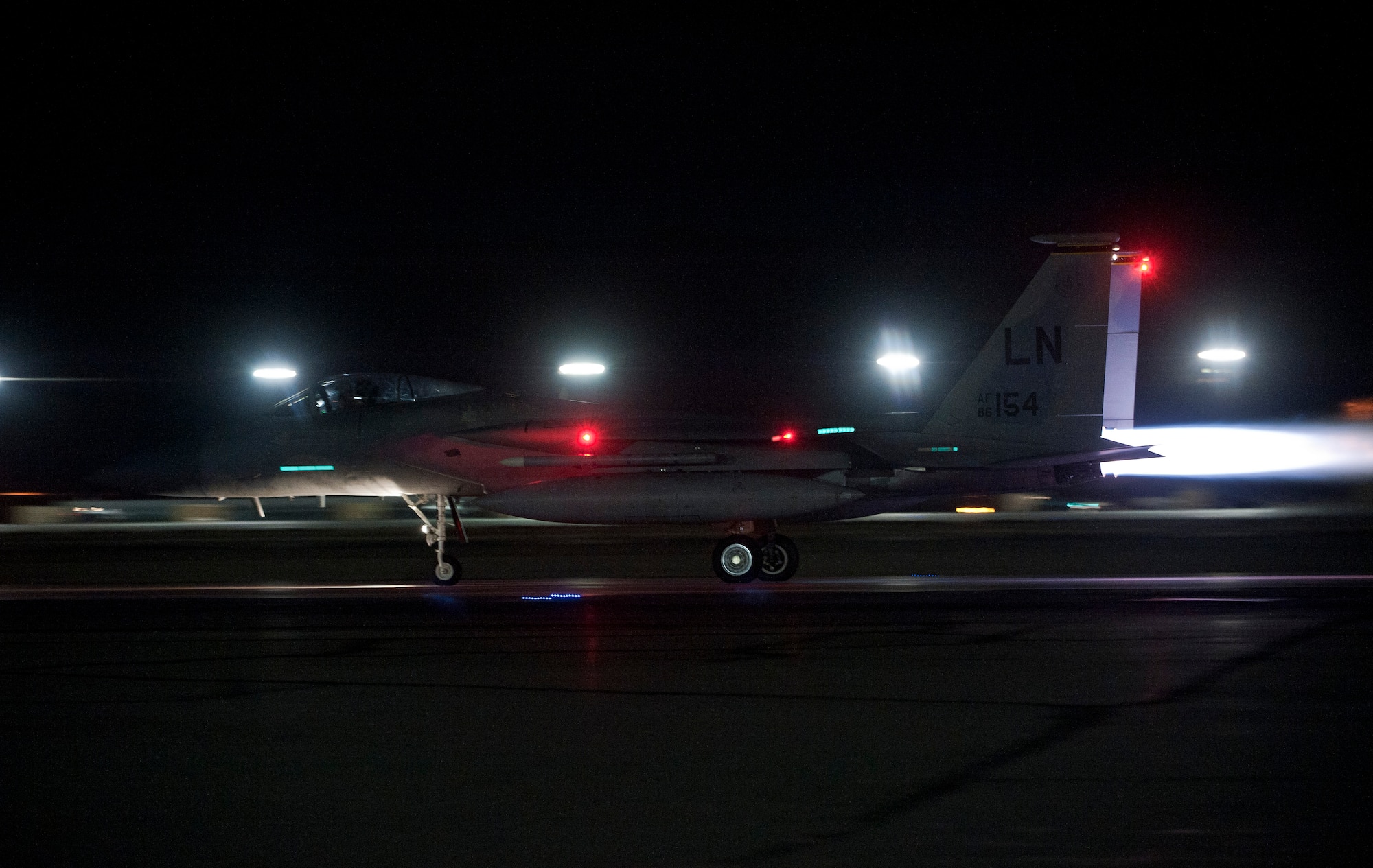 An F-15 Eagle assigned to the 493rd Fighter Squadron, Royal Air Force Lakenheath, England, launches during Red Flag 15-1 at Nellis Air Force Base, Nev., Feb. 4, 2015. Red Flag provides realistic combat training in a contested, degraded and operationally-limited environment, which provides aircrews with real-time war scenarios and helps ground crews test and improve their operational readiness. (U.S. Air Force photo by Staff Sgt. Siuta B. Ika)