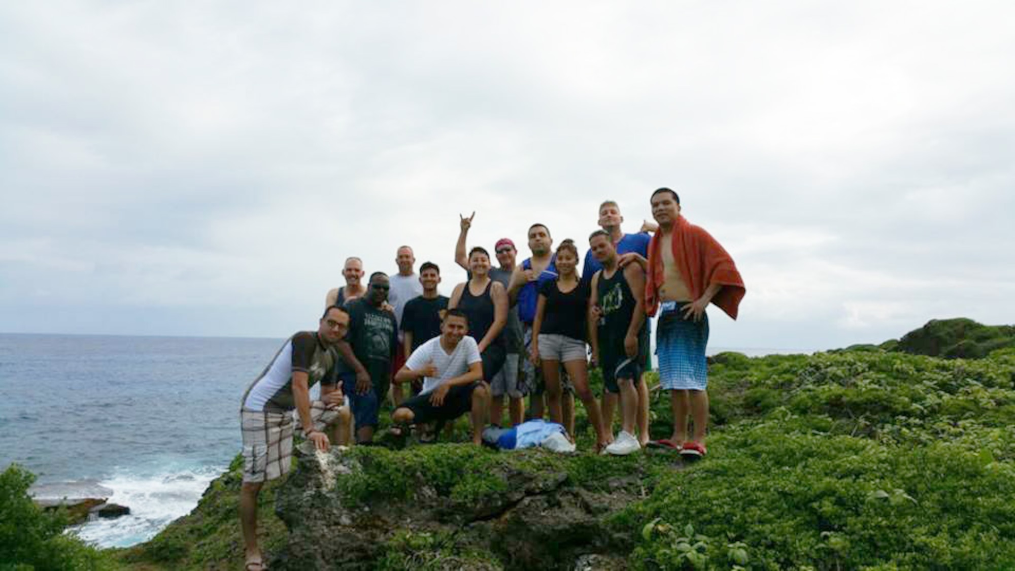 U.S. Air National Guard members from the 146th Airlift Wing Civil Engineering Squadron enjoy an afternoon off and pose for a picture after exploring Marbo Caves in Guam on January 31, 2015. (U.S. Air National Guard photo by Airman 1st Class Madeleine Richards /Released)