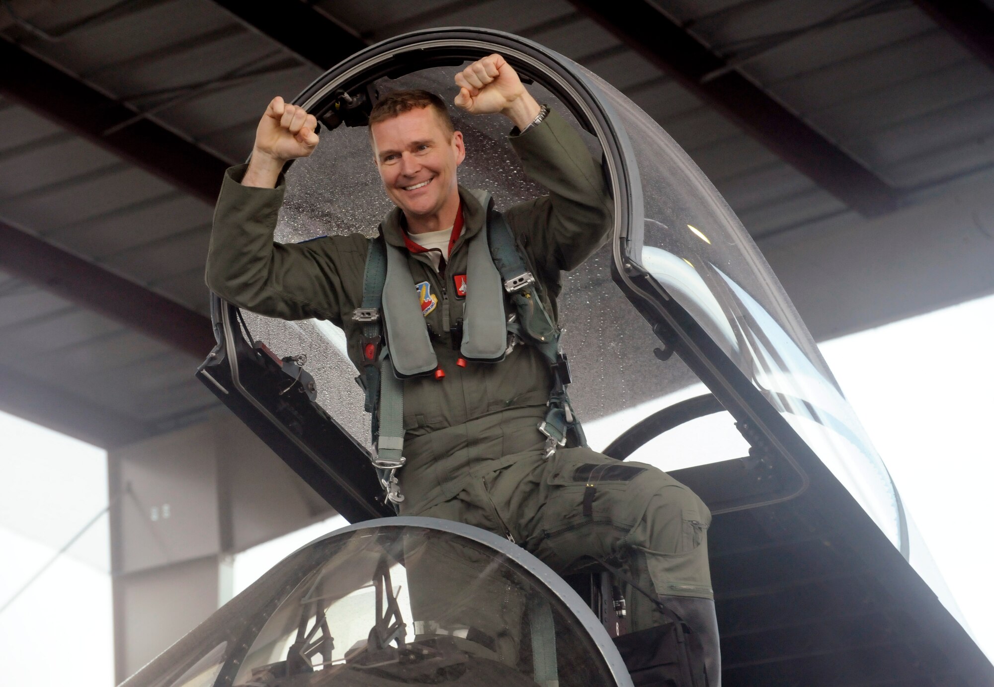 Col. Richard W. Wedan, 142nd Fighter Wing commander, celebrates after his last flight in an F-15 Eagle pilot with in the Air National Guard. Col. Wedan retired from military service later in the day during a formal ceremony held here. (U.S. Air National Guard photo by Tech. Sgt. John Hughel, 142nd Fighter Wing Public Affairs/Released) 