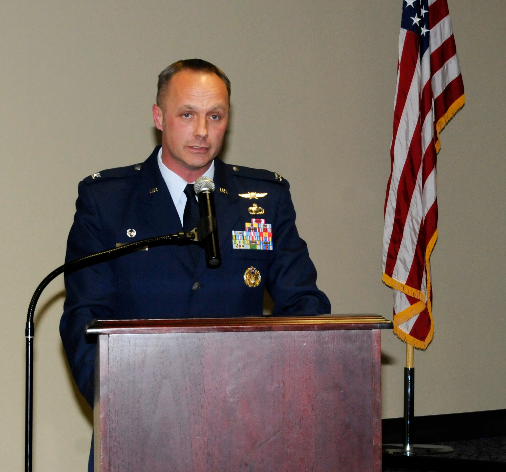 Col. Robert I. Kinney addresses the 188th Intelligence, Surveillance and Reconnaissance Group during his promotion ceremony held Feb. 8, 2015 at Ebbing Air National Guard Base, Fort Smith, Ark. Kinney joined the Air National Guard in 1990 and spent his career in various positions in the intelligence career field around the country. He has served as the 188th ISRG commander since June 2014. (U.S. Air National Guard photo by Staff Sgt. Hannah Dickerson/released)