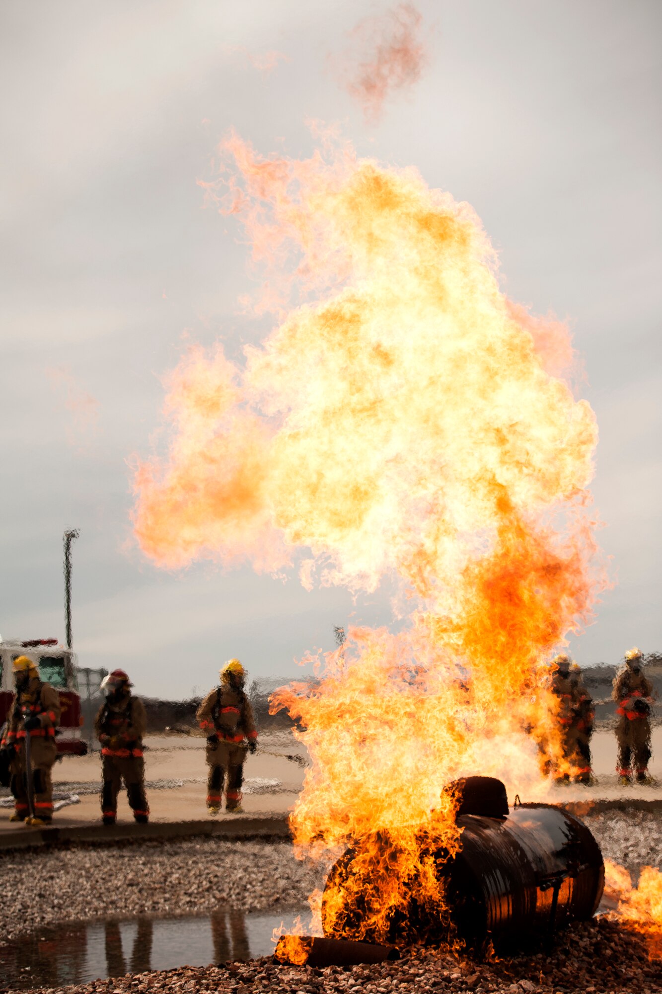 GOODFELLOW AIR FORCE BASE, Texas – A simulation fire burns as students of the 312th Training Squadron prepare to extinguish it, at the Louis F. Garland Department of Defense Fire Fighting Academy, Feb. 3. This is just one of the many static exercises the students engage in for putting out fires.
(U.S. Air Force photo/ Senior Airman Scott Jackson)
