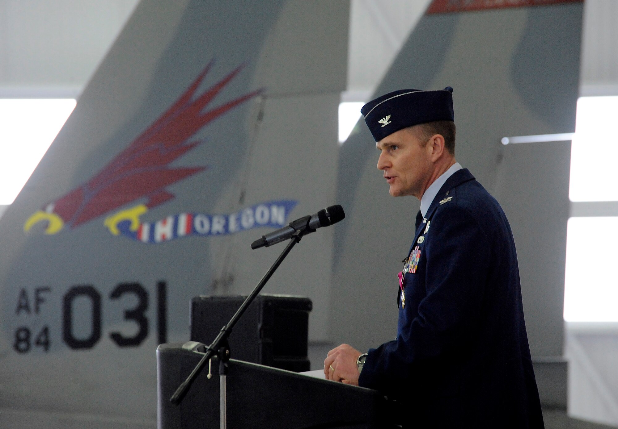 U.S. Air Force Col. Richard W. Wedan, outgoing commander 142nd Fighter Wing, Oregon Air National Guard, gives his farewell remarks as commander of the 142nd Fighter Wing to those attending the Change of Command ceremony for the wing, held at the Portland Air National Guard Base, Ore. Feb. 7, 2015. (U.S. Air National Guard photo by Tech. Sgt. John Hughel, 142nd Fighter Wing Public Affairs)