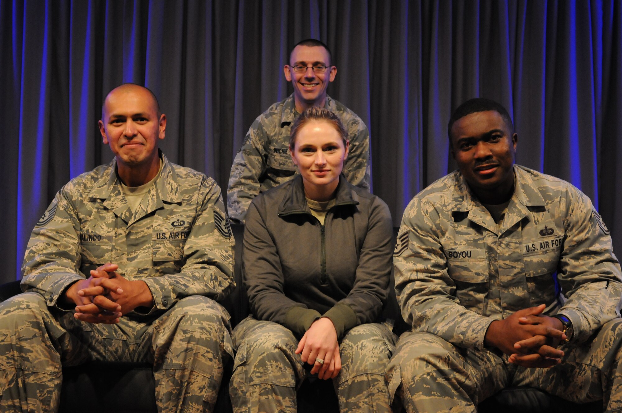 Front row from left, Tech. Sgt. Guadalupe Galindo and Staff Sgt. Amanda Gallegos, 335th Training Squadron instructors, and Staff Sgt. Joseph Boyou, 2nd Air Force data analyst, and back row, Staff Sgt. Andrew Wichie, 334th TRS instructor, shared their stories of personal struggle and resilience with more than 40 attendees during an installment of Air Force Storytellers, Feb. 5 at the Vandenberg Community Center. (U.S. Air Force photo by Airman 1st Class Duncan McElroy/Released)