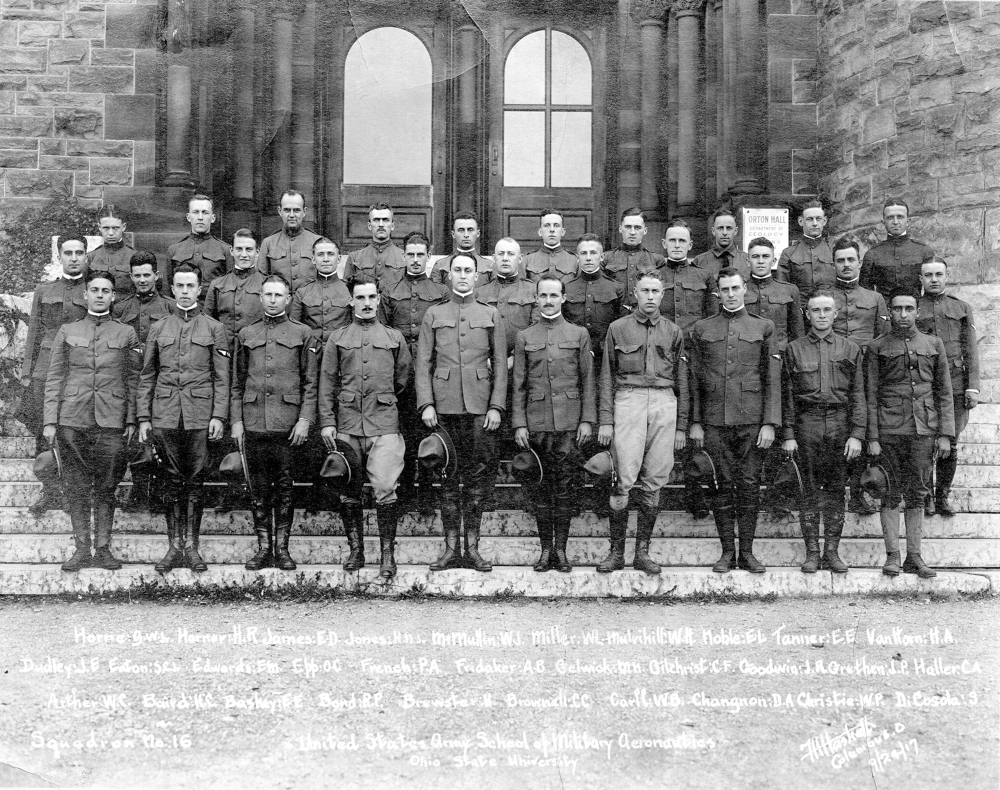 As World War I continued throughout Europe, it quickly became apparent that there was a shortage of trained pilots in the United States. The War Department and the U.S. Army formed the Aviation Cadet Training Program, and commissioned six universities across the country to open aviation schools. The Ohio State University opened the School of Military Aeronautics in May 1917. This photograph of Squadron No. 16 was taken on Sept. 24, 1917, on the steps of Orton Hall.