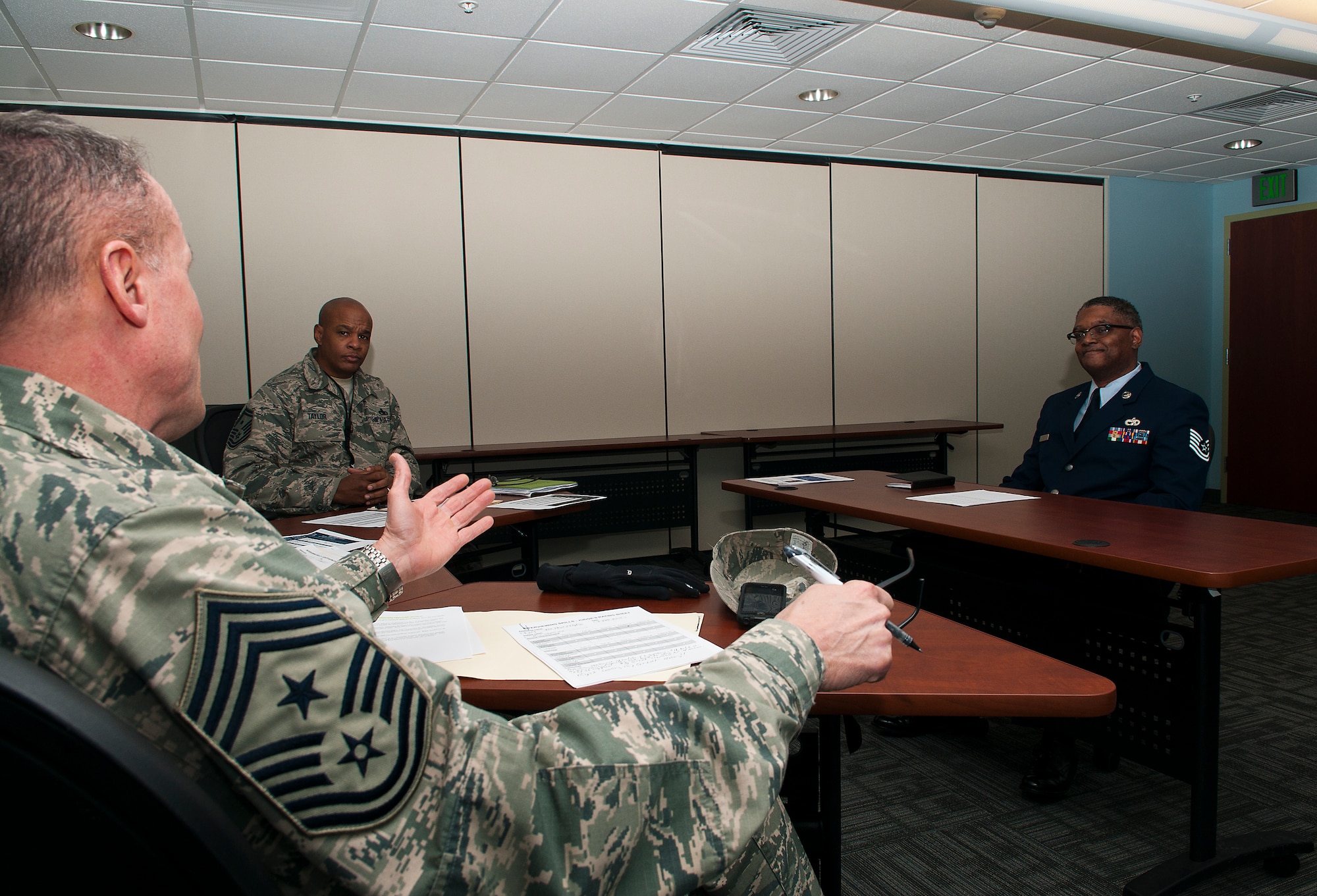 Command Chief Master Sgt. Eric Wallace, 121st Air Refueling Wing, interviews Master Sgt. Earl Walker, 121st Logistic Readiness at Rickenbacker Air National Guard Base, Ohio, Feb. 7, 2015. Members of the 121st Air Refueling Wing participated in a mock board interviews during the February UTA. (U.S. Air National Guard photo by Tech. Sgt, Zachary Wintgens/Released)