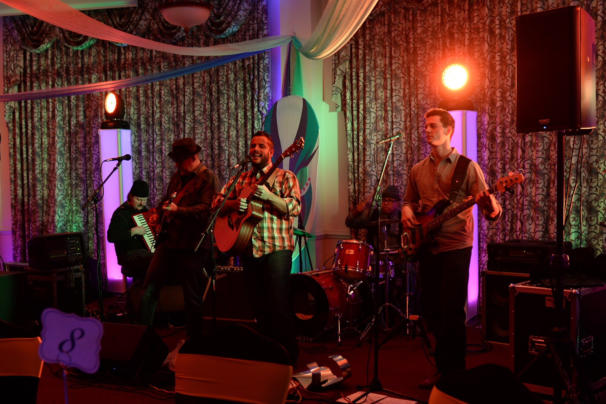 The Crawdaddies band plays during the Mardi Gras event hosted at the Fort Eustis Club at Fort Eustis, Va., Feb., 6, 2015. The event featured music, food and casino games. (U.S. Air Force photo by Staff Sgt. Teresa J. Cleveland/Released)