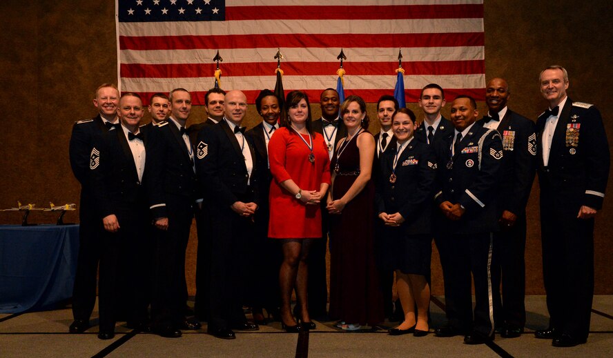 The 52nd Fighter Wing award winners pose with 3rd Air Force and 17th Expeditionary Force and 52nd FW leadership after the 52nd FW 2014 Annual Awards Banquet at the Skelton Memorial Fitness Center at Spangdahlem Air Base, Germany, Feb. 7, 2015. Thirteen out of 62 nominees earned awards in 13 different categories. (U.S. Air Force photo by Airman 1st Class Timothy Kim/Released)