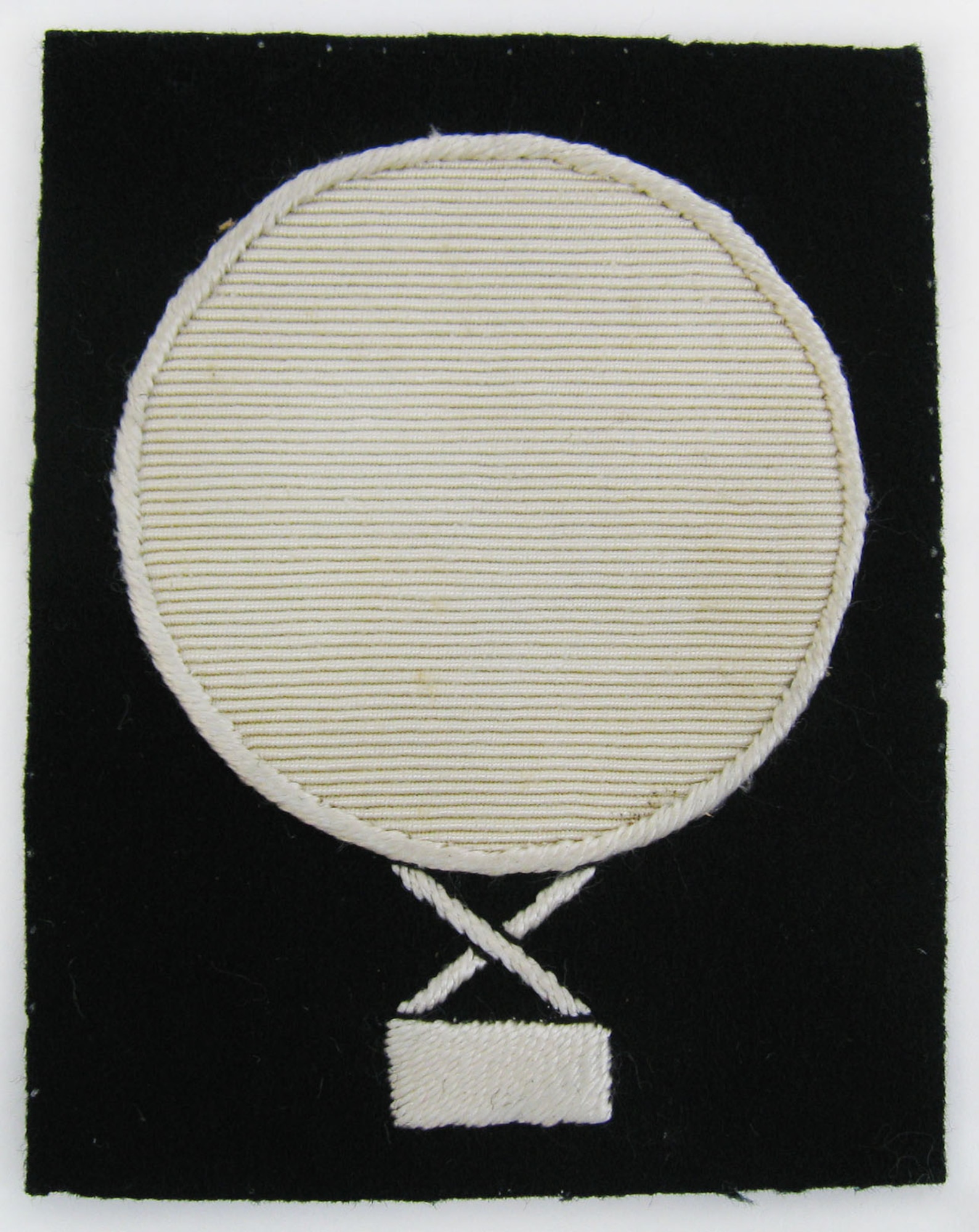 This insignia was worn by U.S. balloon mechanics in the Air Service's Balloon Section during World War I. U.S. balloon mechanics were trained in Europe by specialists from French balloon units, which had been in service for approximately 10 years prior. Maintaining balloons was an important requirement, as balloons were used in WWI primarily for day and night observation (locating targets and tracking activity behind enemy lines), as well as regulating artillery fire. (U.S. Air Force photo)