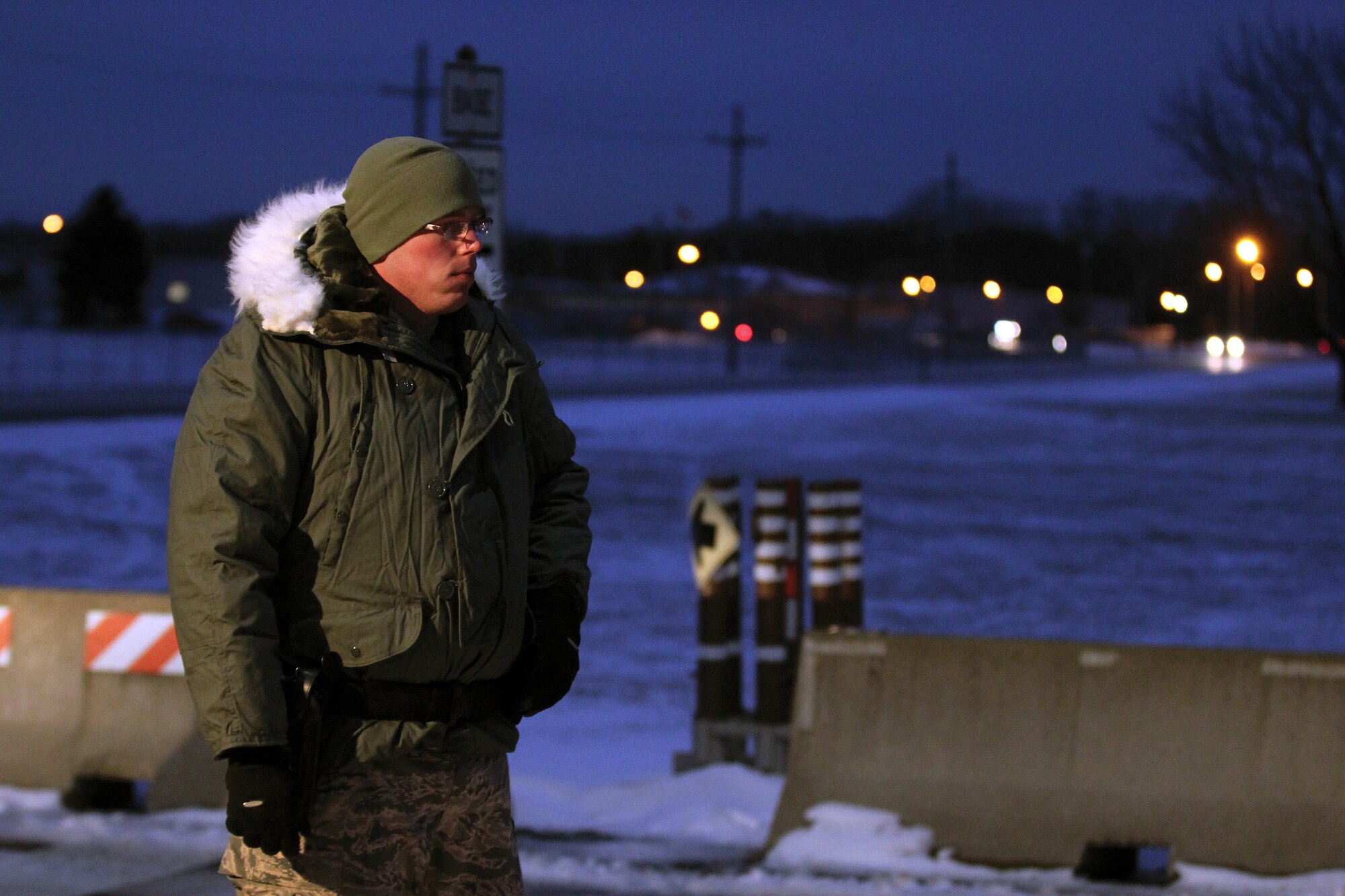 WRIGHT-PATTERSON AIR FORCE BASE, Ohio – Senior Airman Robert Cole, 445th Security Forces Squadron, is dressed for the 4 below zero temperature while waiting for the next vehicle to come through Gate 26A during the Jan. 11, 2015 445th Airlift Wing unit training assembly. (U.S. Air Force photo/Tech. Sgt. Patrick O'Reilly)