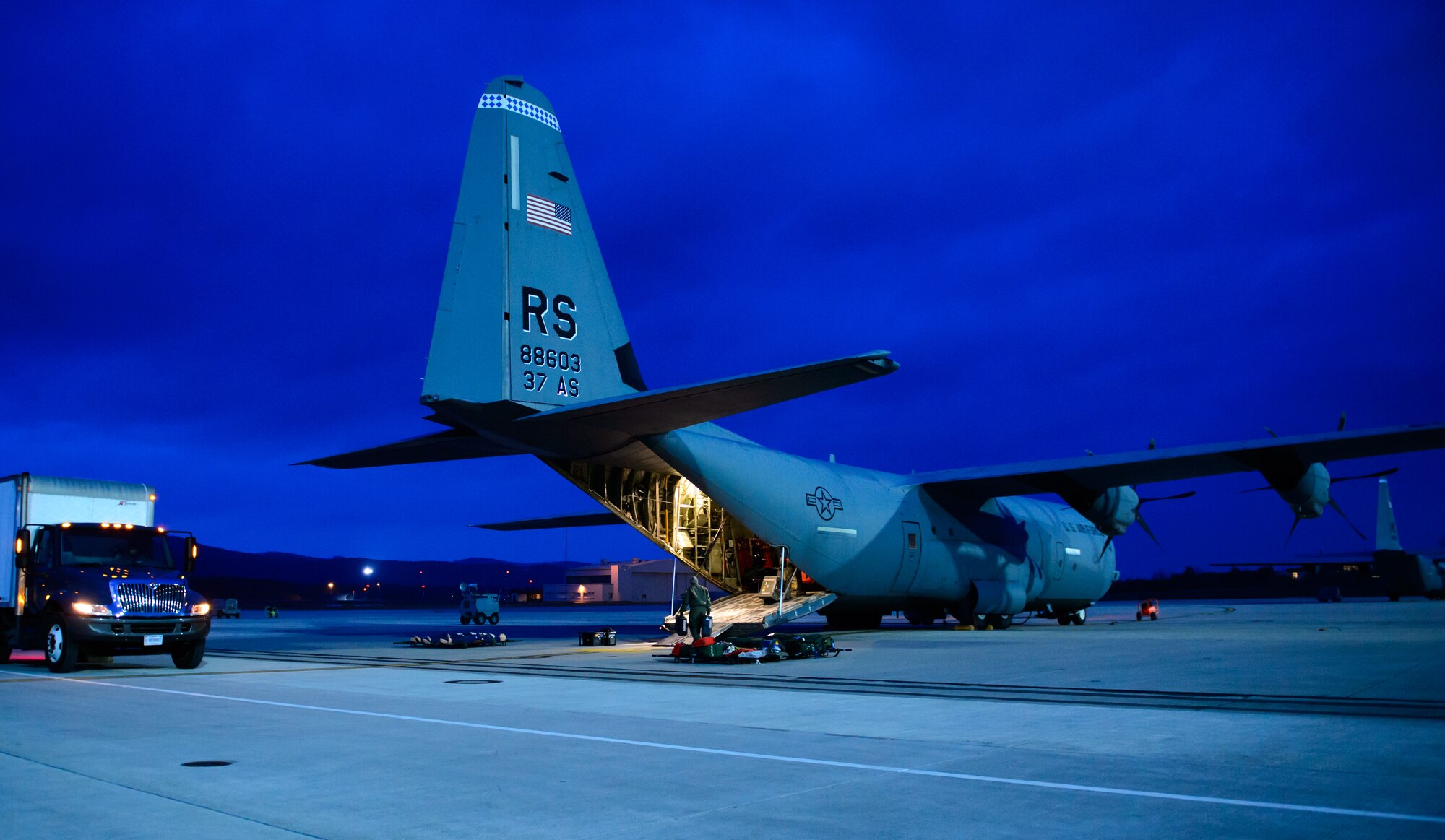 A C-130J Super Hercules is prepared by aeromedical evacuation crew members for a training sortie at Ramstein Air Base, Germany, Feb. 6, 2015. The crew reconfigures the aircraft for aeromedical evacuations in less than one hour to ensure take-off times are met. (U.S. Air Force photo/Senior Airman Armando A. Schwier-Morales) 