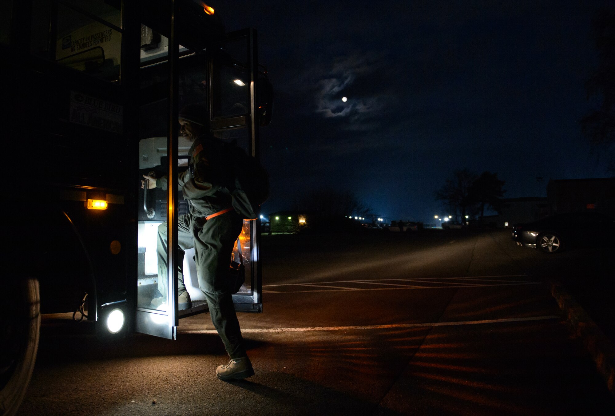 An 86th Aeromedical Evacuation Squadron member loads a bus after a preflight briefing at Ramstein Air Base, Germany, Feb. 6, 2015. Aeromedical Evacuation Squadron members have only a few hours to go from their bed to the skies to ensure they are able to transport patients anytime, anywhere. (U.S. Air Force photo/Senior Airman Armando A. Schwier-Morales)