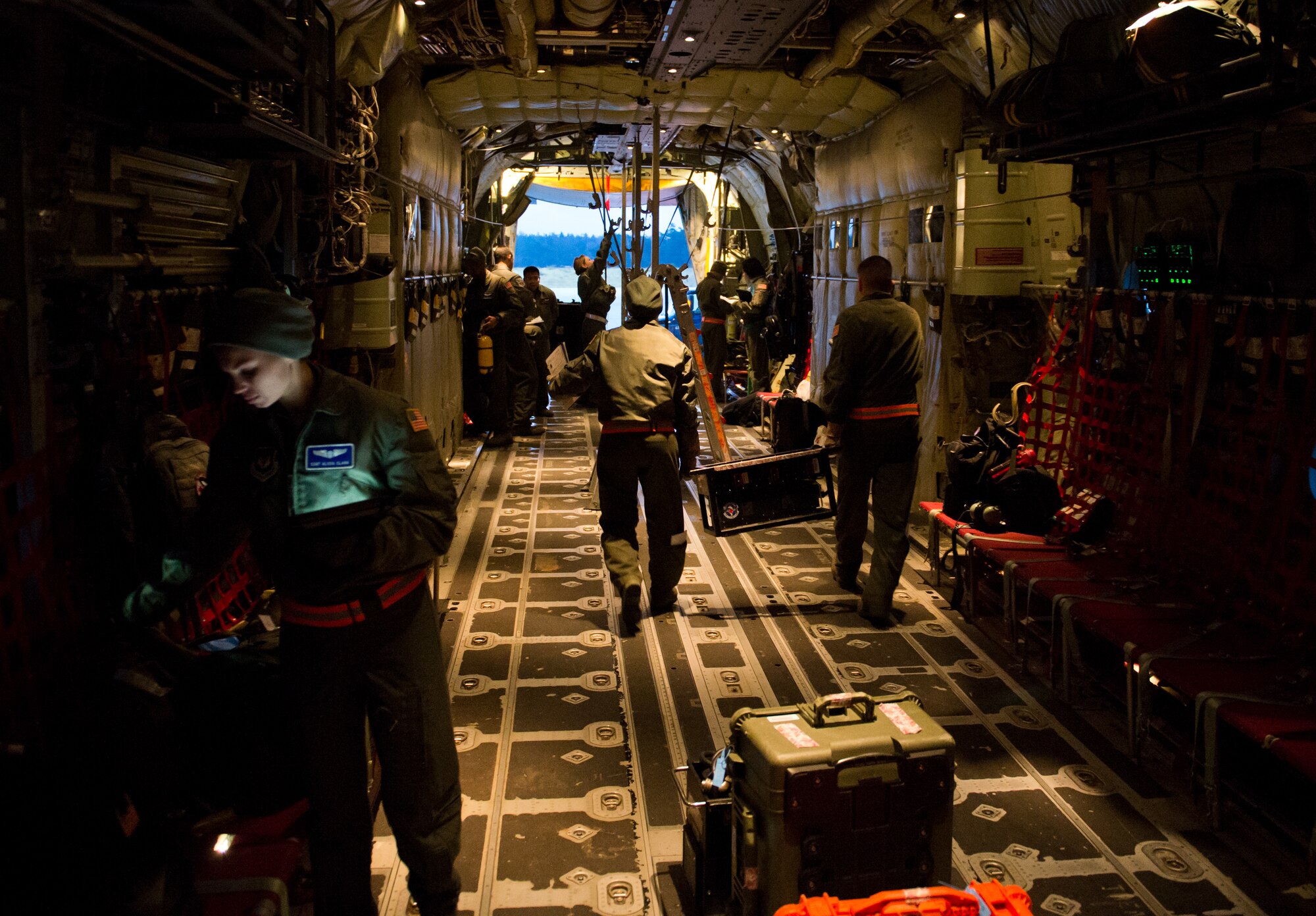 Airmen from the 86th Aeromedical Evacuation Squadron set up a C-130J Super Hercules for an aeromedical evacuation mission at Ramstein Air Base, Germany, Feb. 6, 2015. The Airmen were training to be ready to respond to any emergency anytime, anywhere. (U.S. Air Force photo/Senior Airman Armando A. Schwier-Morales)