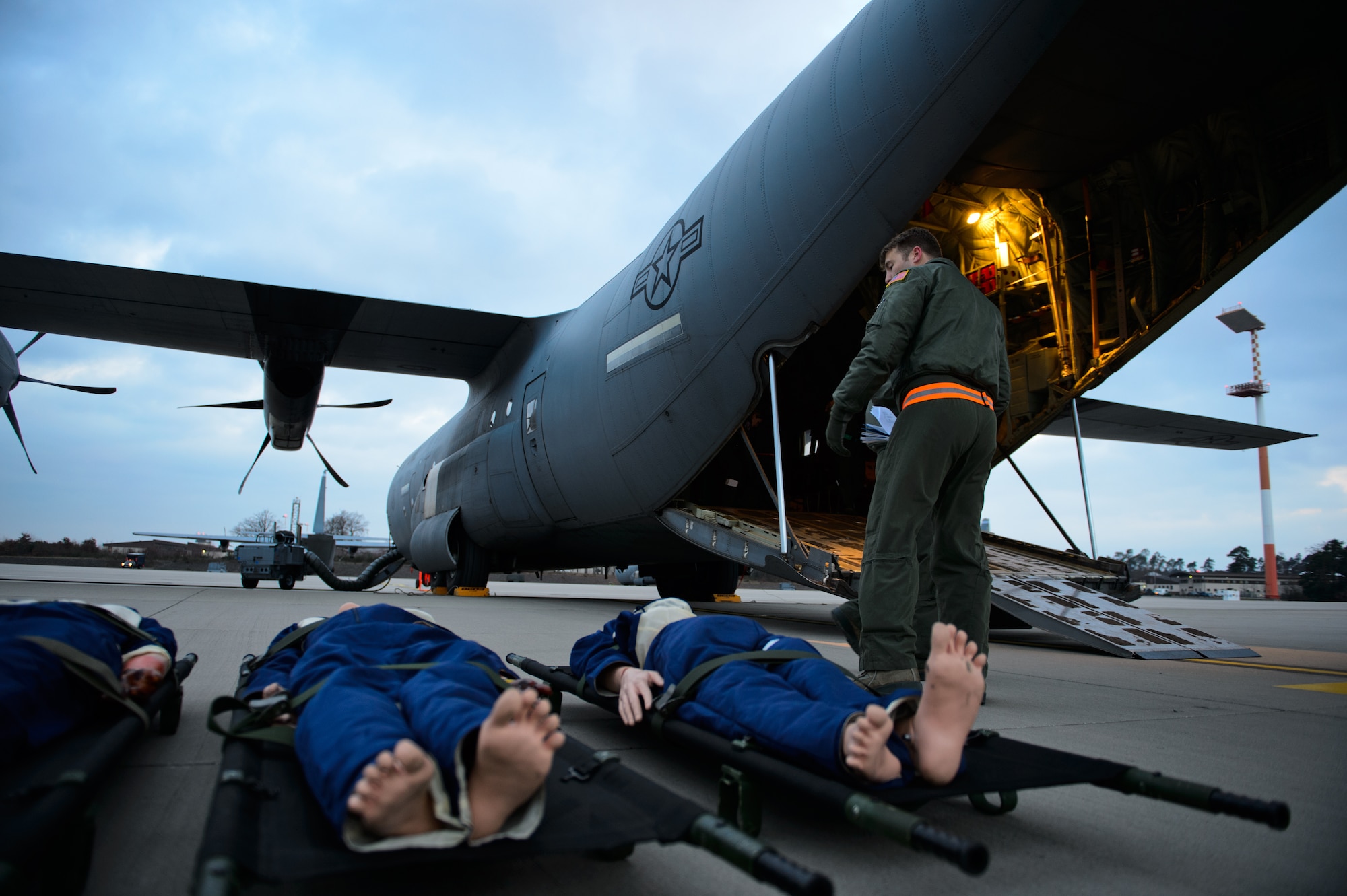 Airmen from the 86th Aeromedical Evacuation Squadron prepare mannequins during a training sortie at Ramstein Air Base, Germany, Feb. 6, 2015. Several Airmen took to the skies to train and test their skills in ensuring proper patient care. (U.S. Air Force photo/Senior Airman Armando A. Schwier-Morales) 