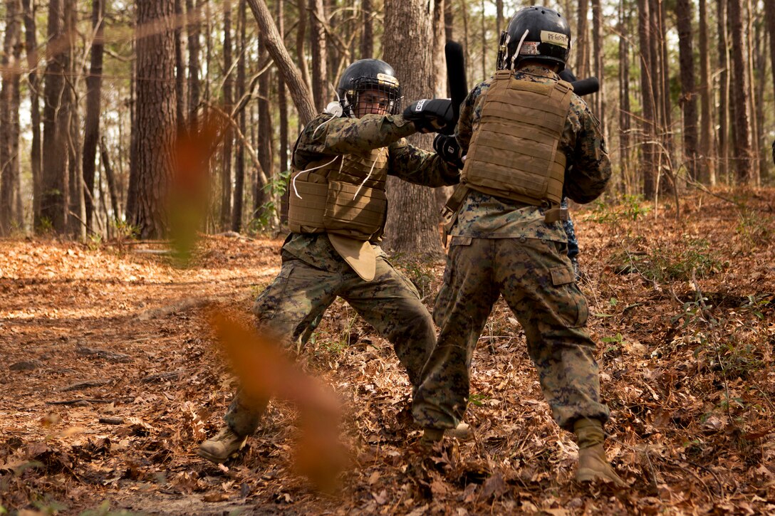 Marine Corps Sgts. JohnDavid A. Amador, left, and Brianna M. Register