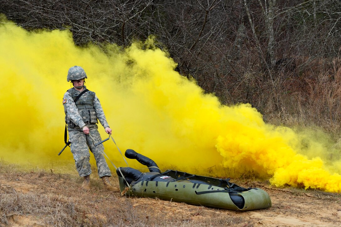 Army Sgt. Barbara Creamer Conducts A Dummy Drag During The Stress Shoot 