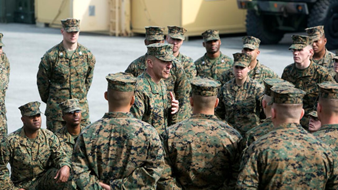Brig. Gen. Charles G. Chiarotti, Commanding General, 2nd Marine Logistics Group, speaks with Marines with Marine Air Ground Task Force Materiel Distribution Company following the company’s activation ceremony, Feb. 9, 2015, aboard Camp Lejeune, North Carolina. The company has been created within 2nd Supply Battalion, Combat Logistics Regiment 25, 2nd Marine Logistics Group, to establish a proof of principle on the reorganization of intermediate supply and distribution capabilities in order to provide tailored capabilities to units deploying in support if the II Marine Expeditionary Force. This new company will be comprised of some preexisting platoons from Supply Company, as well as a motor transportation capability from the Headquarters and Support Company and an additional 30 Marines to form Distribution Liaison Cells.