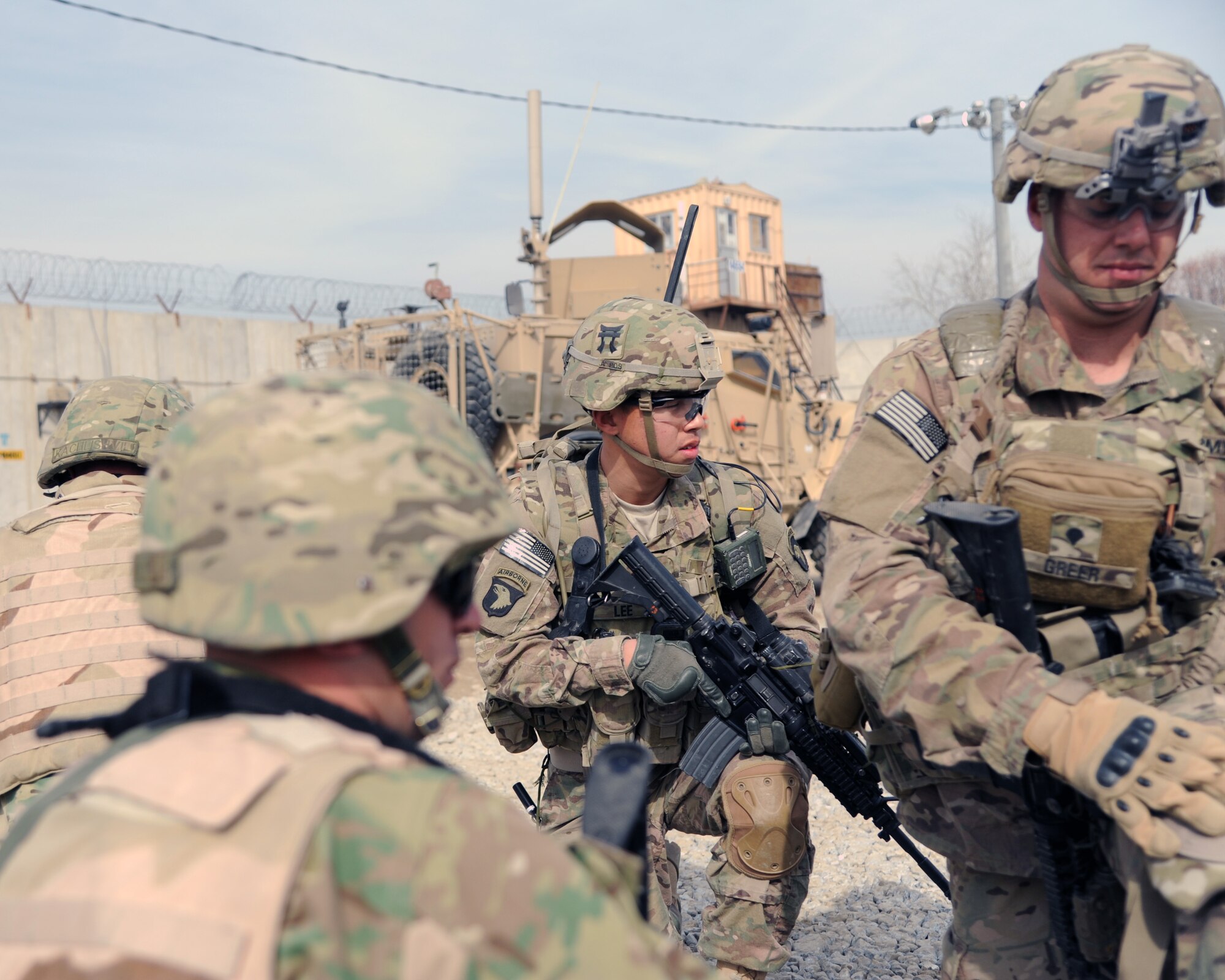 U.S. Army and Georgian service members respond to a simulated attack on the base during a combined-joint training exercise at Bagram Airfield, Afghanistan Feb. 6, 2015. U.S. and Georgian service members participated in the base-wide exercise enhancing their abilities to respond in the event of attacks on the base and mass casualty incidents.  (U.S. Air Force photo by Master Sgt. James Law/released)