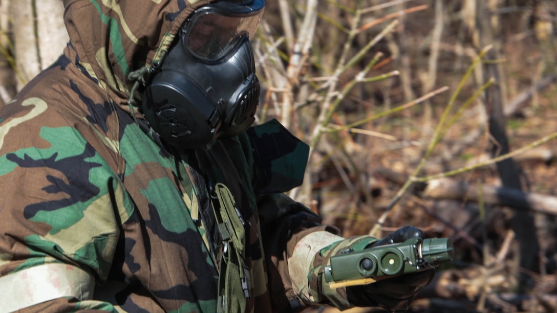 Marines from Marines Forces Reserve practice how to properly report a casualty and possible toxic gas during a chemical, biological, radiological and nuclear defense training simulation aboard Naval Air Station Joint Reserve Base New Orleans, Feb. 5, 2015. When they locate a casualty, Marines must report it to the control center and wait for further instructions. The CBRN defense training equips Marines from diverse units, with the proper knowledge and readiness needed to handle a real combat zone situation.