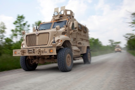 Deploying Soldiers will drive Mine Resistant Ambush Protective vehicles during driver training at Camp Atterbury Joint Maneuver
Training Center. With the proposed increase in MRAPs on Camp Atterbury, deploying units will be able to train on theater specific MRAPs, like these Maxx-Pros, which see more use in Iraq.