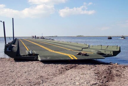 Louisiana National Guardsmen of 2225th Multi-Role Bridge Company, 205th Engineer Battalion, use two Bridge Erection Boats (BEBs) to position Improved Ribbon Bridge bays into place to serve as temporary wharf.