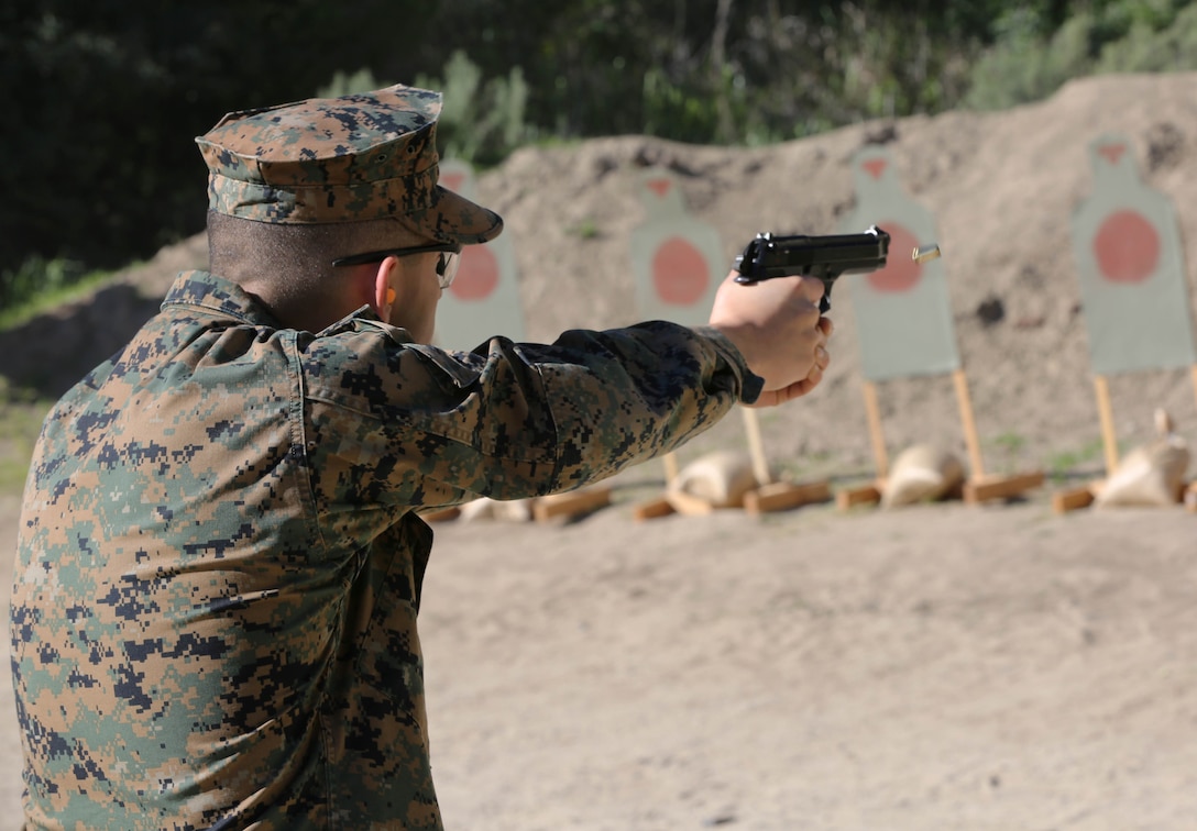 Marines from Headquarters and Support Battalion learned basic marksmanship skills using the M1014 combat shotgun and the M9 service pistol at range 206, Feb. 11. The Marines competed in friendly competitions to improve team morale such as a sprint followed by a speed load and shoot. 