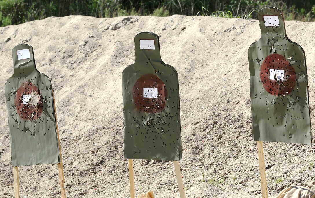 Marines from Headquarters and Support Battalion learned basic marksmanship skills using the M1014 combat shotgun and the M9 service pistol at range 206, Feb. 11. The Marines competed in friendly competitions to improve team morale such as a sprint followed by a speed load and shoot. 