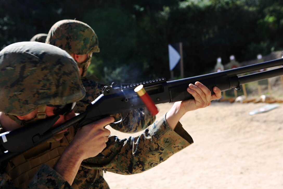 Marines from Headquarters and Support Battalion learned basic marksmanship skills using the M1014 combat shotgun and the M9 service pistol at range 206, Feb. 11. The Marines competed in friendly competitions to improve team morale such as a sprint followed by a speed load and shoot.