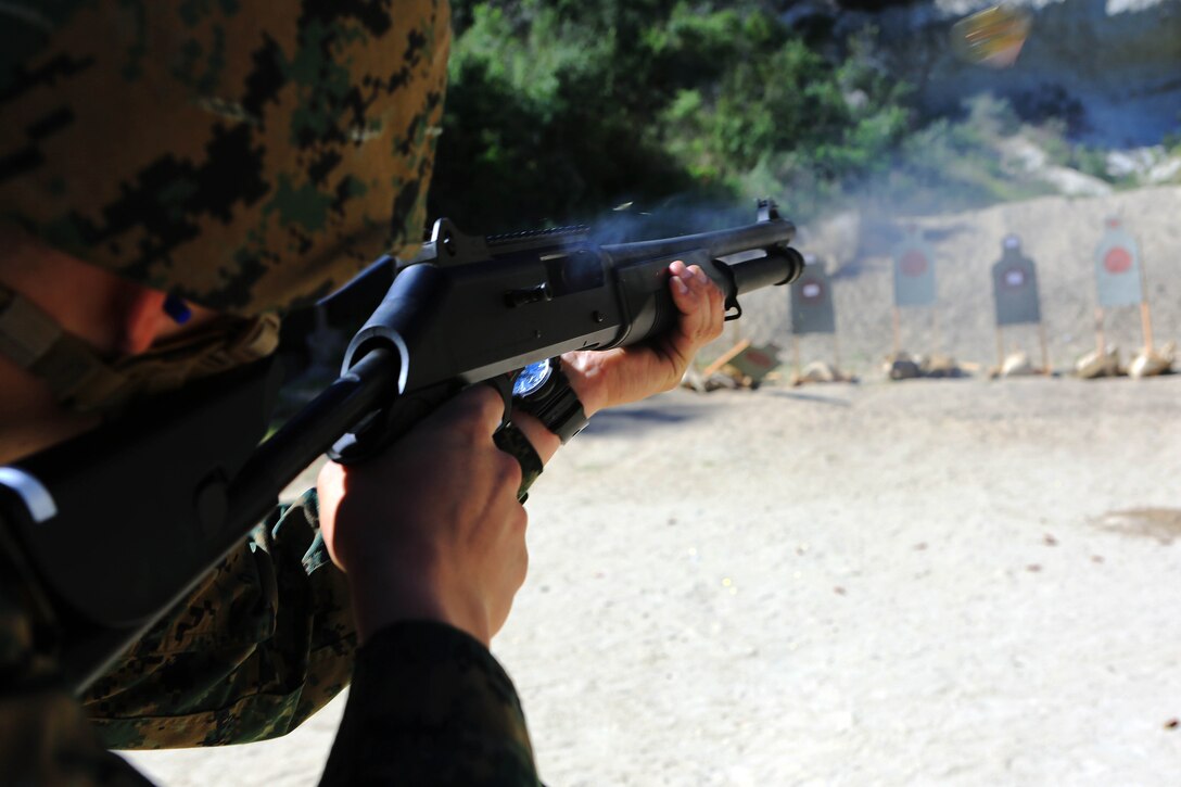 Marines from Headquarters and Support Battalion learned basic marksmanship skills using the M1014 combat shotgun and the M9 service pistol at range 206, Feb. 11. The Marines competed in friendly competitions to improve team morale such as a sprint followed by a speed load and shoot. 