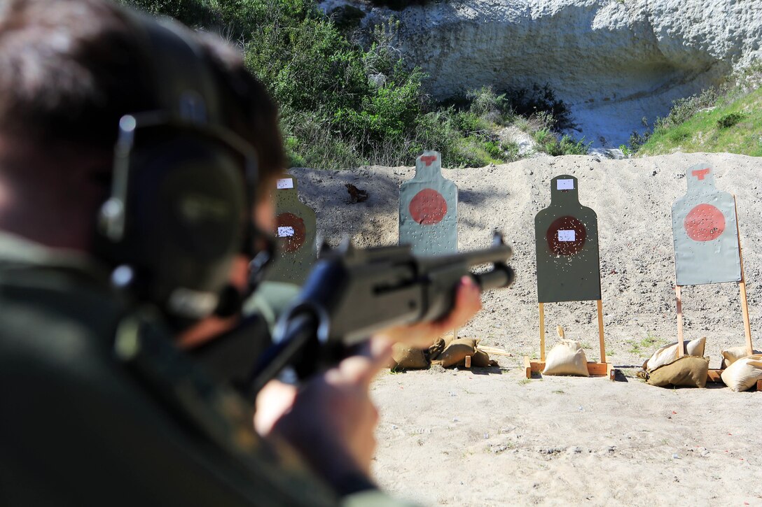 Marines from Headquarters and Support Battalion learned basic marksmanship skills using the M1014 combat shotgun and the M9 service pistol at range 206, Feb. 11. The Marines competed in friendly competitions to improve team morale such as a sprint followed by a speed load and shoot. 