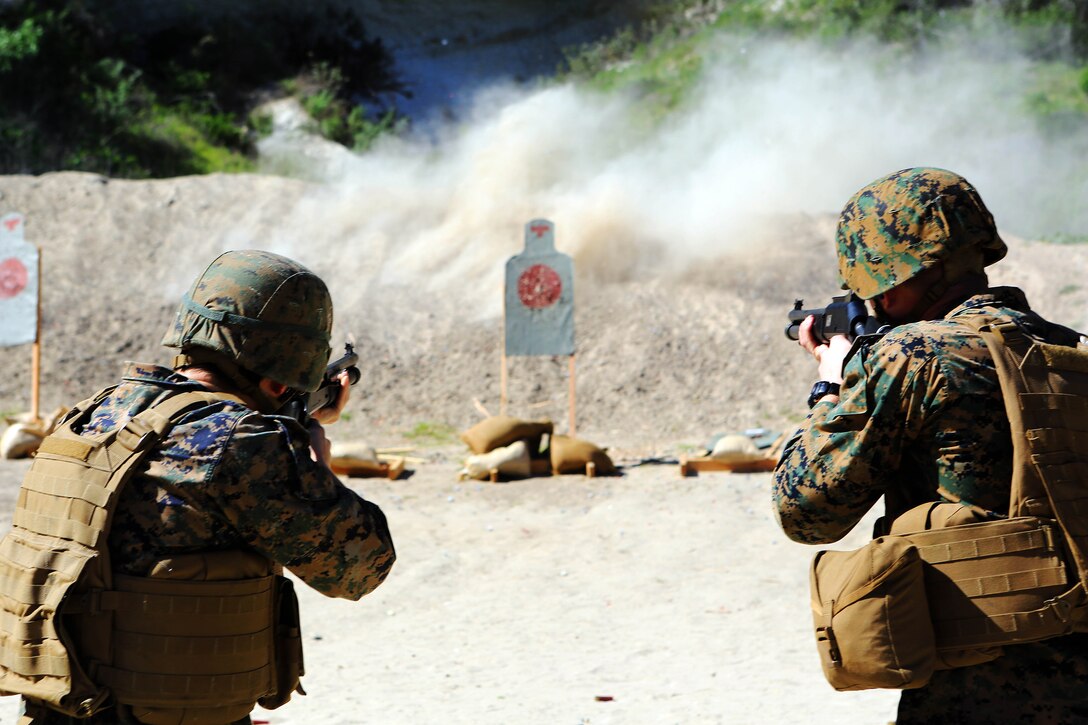 Marines from Headquarters and Support Battalion learned basic marksmanship skills using the M1014 combat shotgun and the M9 service pistol at range 206, Feb. 11. The Marines competed in friendly competitions to improve team morale such as a sprint followed by a speed load and shoot.