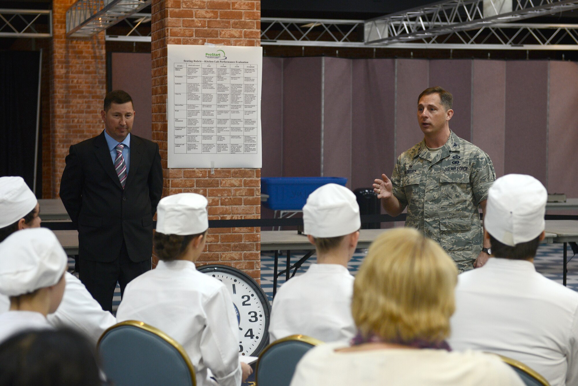 Col. Scott Maskery, 374th Mission Support Group commander, welcomes participants to the 2015 Far East Culinary Arts competition at Yokota Air Base, Japan, Feb. 5, 2015. Students from six schools within Pacific Air Force took part in the competition, which tested teamwork, knife skills, sanitation, menu presentation and the taste of their final product. (U.S. Air Force photo by Airman 1st Class David C. Danford/Released)