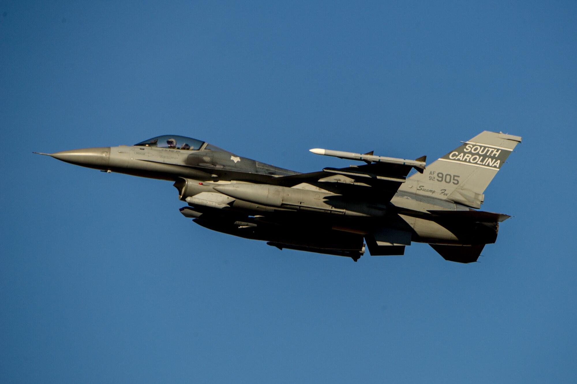 A U.S. Air Force F-16 Fighting Falcon Block 52, assigned to the 169th Fighter Wing, flies overhead during surge flying operations, Feb. 7, 2015, at McEntire Joint National Guard Base, S.C. The surge encompasses high tempo flying as part of vital training in preparation for deployments. (U.S. Air National Guard photo by Tech. Sgt. Jorge Intriago/Released)