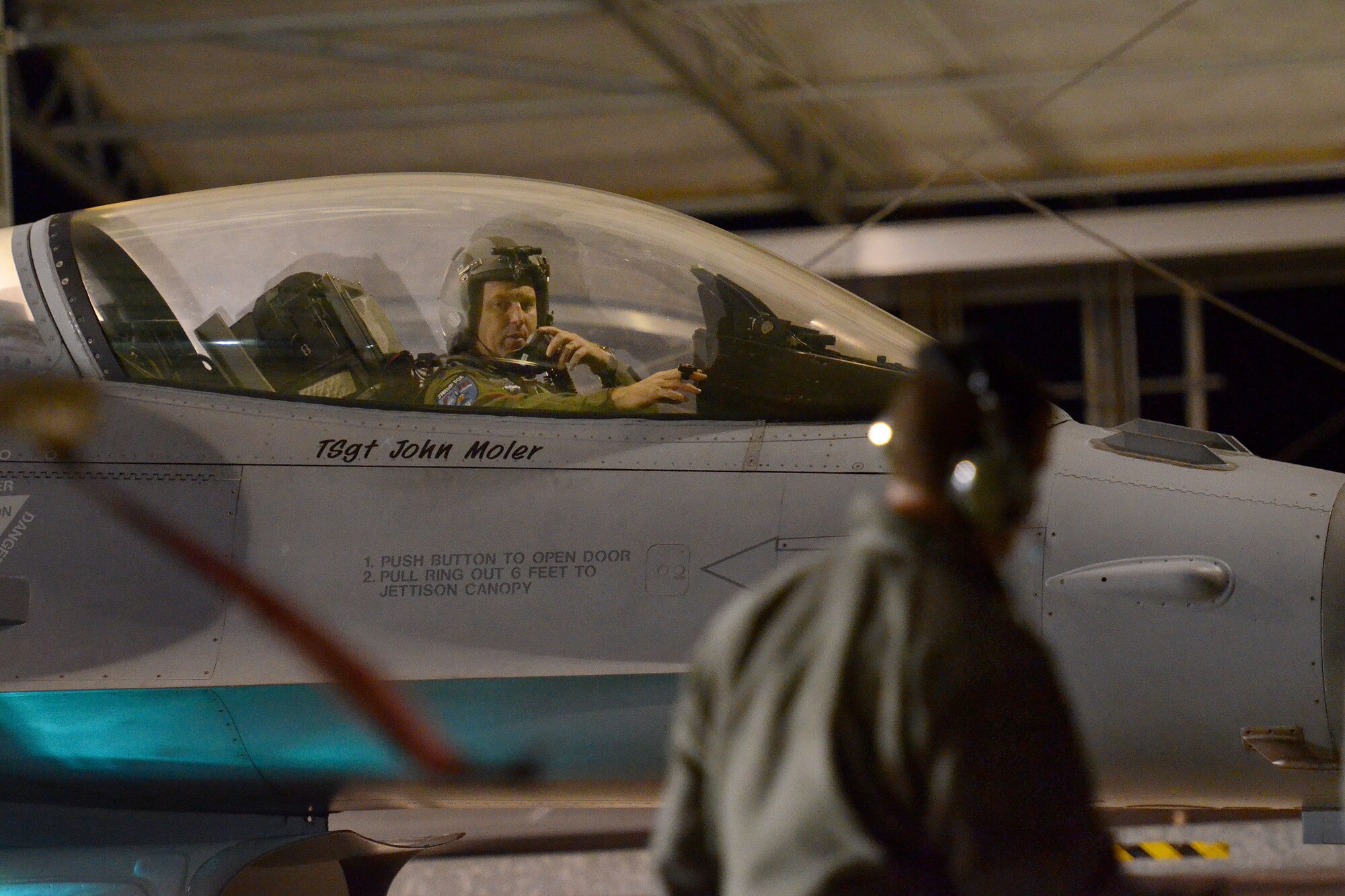 U.S. Air Force Lt. Col. Brent Allen, a fighter pilot assigned to the 157th Fighter Squadron at McEntire Joint National Guard Base, South Carolina Air National Guard, prepares to launch an F-16 Fighting Falcon for a night training mission during surge flying operations Feb. 7, 2015. The surge encompasses high tempo flying as part of vital training for deployments. (U.S. Air National Guard photo by Airman 1st Class Ashleigh S. Pavelek/Released)