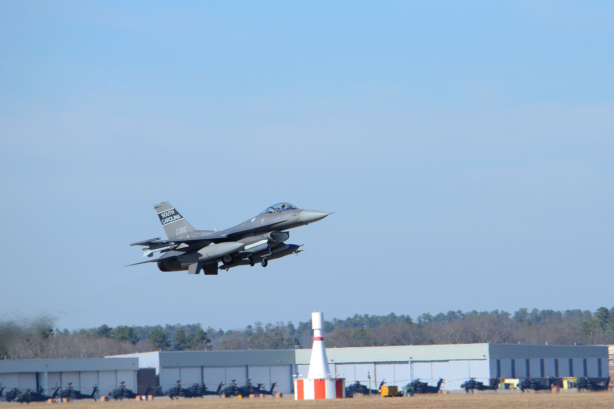 A U.S. Air Force fighter pilot, assigned to the 157th Fighter Squadron at McEntire Joint National Guard Base, South Carolina Air National Guard, launches an F-16 Fighting Falcon druing surge flying operations Feb. 7, 2015. The surge encompasses high tempo flying as part of vital training for deployments. (U.S. Air National Guard photo by Airman 1st Class Ashleigh S. Pavelek/Released)