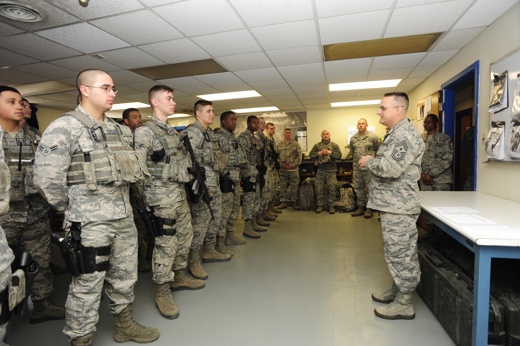 Chief Master Sgt. Harold Hutchison, Pacific Air Forces’ command chief, speaks to defenders during a tour of the 8th Security Forces Squadron at Kunsan Air Base, Republic of Korea, Feb. 9, 2015. Hutchison also toured the base, interacting with Airmen from different units, and finished his visit with an enlisted all-call. (U.S. Air Force photo by Senior Airman Taylor Curry/Released) 