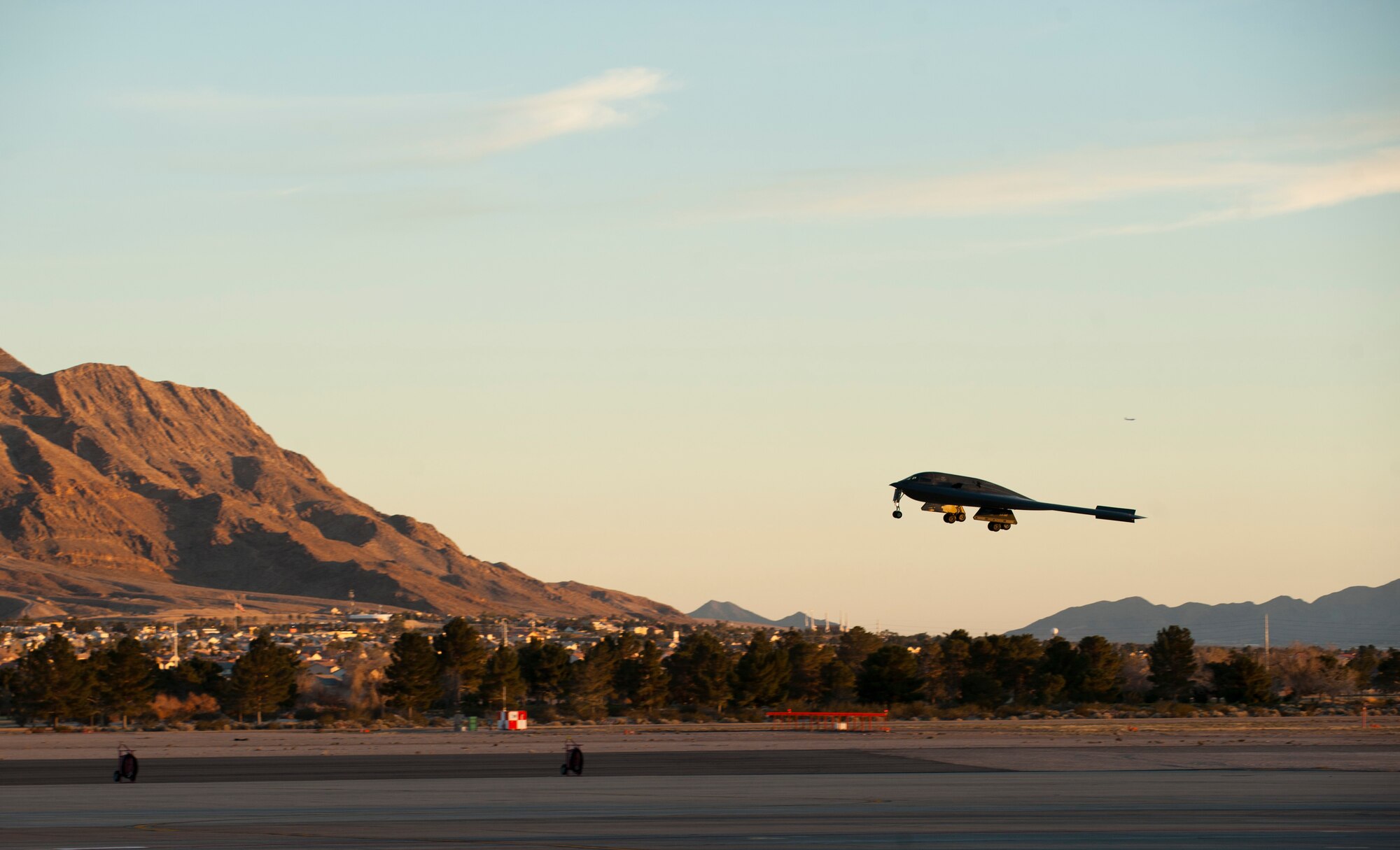 A B-2 Spirit assigned to the 393rd Bomb Squadron, Whiteman Air Force Base, Mo., lands after a training mission during Red Flag 15-1 at Nellis AFB, Nev., Feb. 6, 2015. Red Flag is an exercise hosted at Nellis AFB, Nev. that provides aircrews an opportunity to experience realistic, stressful combat situations in a controlled environment to increase mission capability. (U.S. Air Force photo by Senior Airman Thomas Spangler)