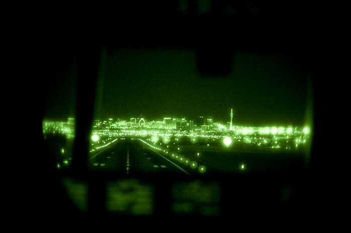 A Royal Australian air force C-130J Super Hercules, assigned to 37 Squadron, Richmond, Australia, lands after a training mission during Red Flag 15-1 at Nellis Air Force Base, Nev., Feb. 9, 2015. Since its establishment in 1975, Red Flag has played host to military units from more than 30 countries. (U.S. Air Force photo by Senior Airman Thomas Spangler)