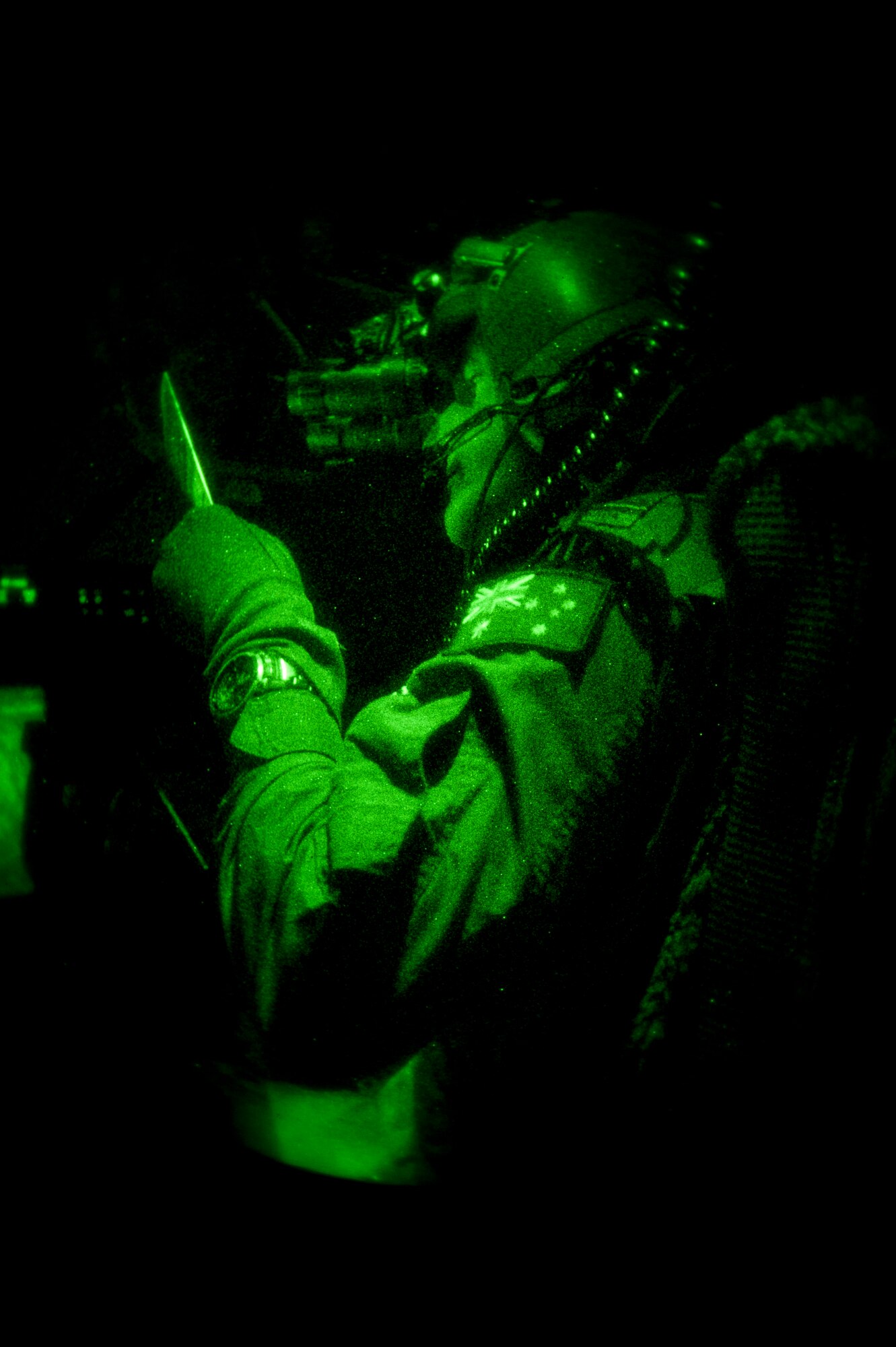 A Royal Australian air force C-130J Super Hercules pilot, prepares for a training exercise during Red Flag 15-1 at Nellis Air Force Base, Nev., Feb. 9, 2015. Flying units from around the globe deploy to Nellis AFB to participate in Red Flag, an exercise held four times a year and organized by the 414th Combat Training Squadron. (U.S. Air Force photo by Senior Airman Thomas Spangler)