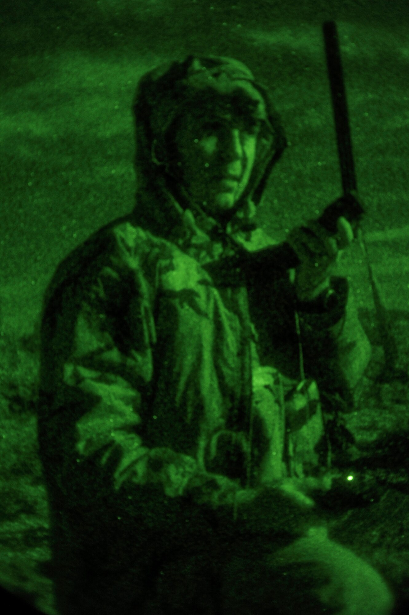 A pilot awaits assistance during a Red Flag 15-1 simulated downed pilot exercise at the Nevada Test and Training Range, Nev. Feb. 6, 2015.  During the scenario numerous agencies were bought together to collaborate their forces to rescue a pilot from behind enemy lines. (U.S. Air Force photo by Staff Sgt. Darlene Seltmann)