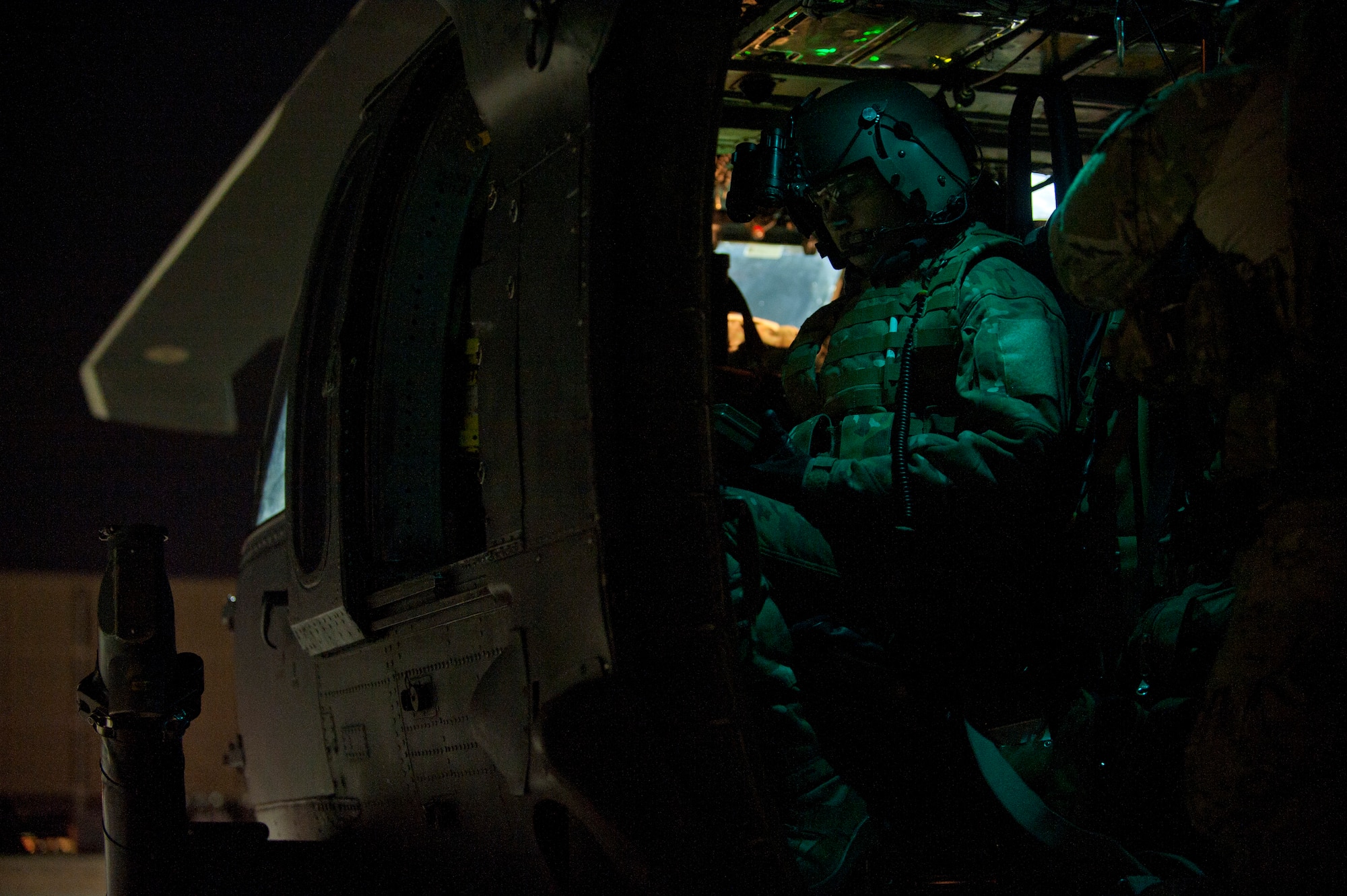 Staff Sgt. Lucas Spain, a special missions aviator assigned the 66th Rescue Squadron, runs through pre-flight checks on an HH-60G Pave Hawk in preparation for a personnel recovery training scenario during Red Flag 15-1 at Nellis Air Force Base, Nev., Feb. 5, 2015. A variety of combat search and rescue scenarios can be presented during Red Flag to test aircrews and pararescuemen on different aspects of their diverse mission set. (U.S. Air Force photo by Airman 1st Class Joshua Kleinholz)