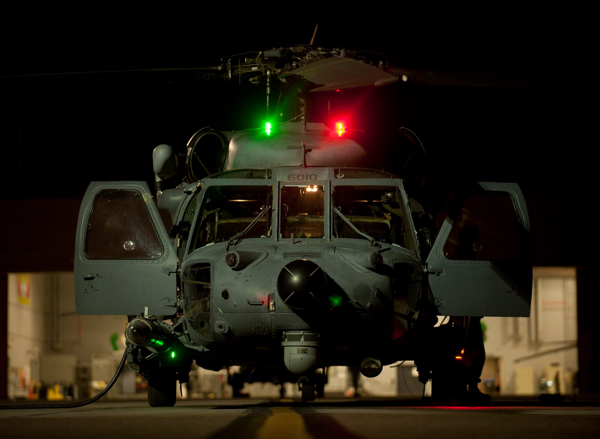 An HH-60G Pave Hawk assigned to the 66th Rescue Squadronis serviced by maintainers prior to a Red Flag 15-1 personnel recovery training scenario at Nellis Air Force Base, Nev., Feb. 5, 2015. The Pave Hawk is the U.S. Air Force version of the UH-60 Black Hawk modified for aircrew search and rescue in all-weather situations. The Pave Hawk performs special missions including search and rescue, combat support and airborne medical evacuation. (U.S. Air Force photo by Airman 1st Class Joshua Kleinholz)