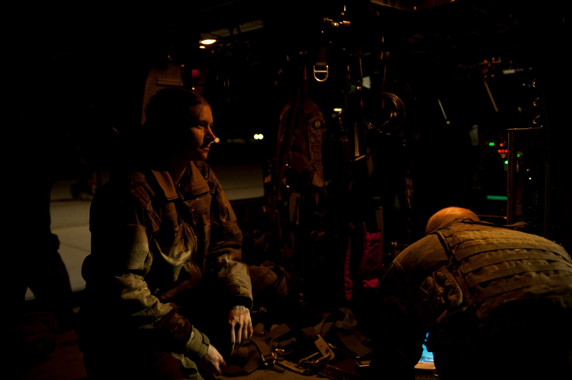 Senior Airman Natasha Libby, a special missions aviator assigned the 66th Rescue Squadron, prepares for a personnel recovery training scenario during Red Flag 15-1 at Nellis Air Force Base, Nev., Feb. 5, 2015. Special missions aviators are responsible for the safety of onboard passengers, as well as the protection of the aircraft from threats to mission accomplishment. (U.S. Air Force photo by Airman 1st Class Joshua Kleinholz)