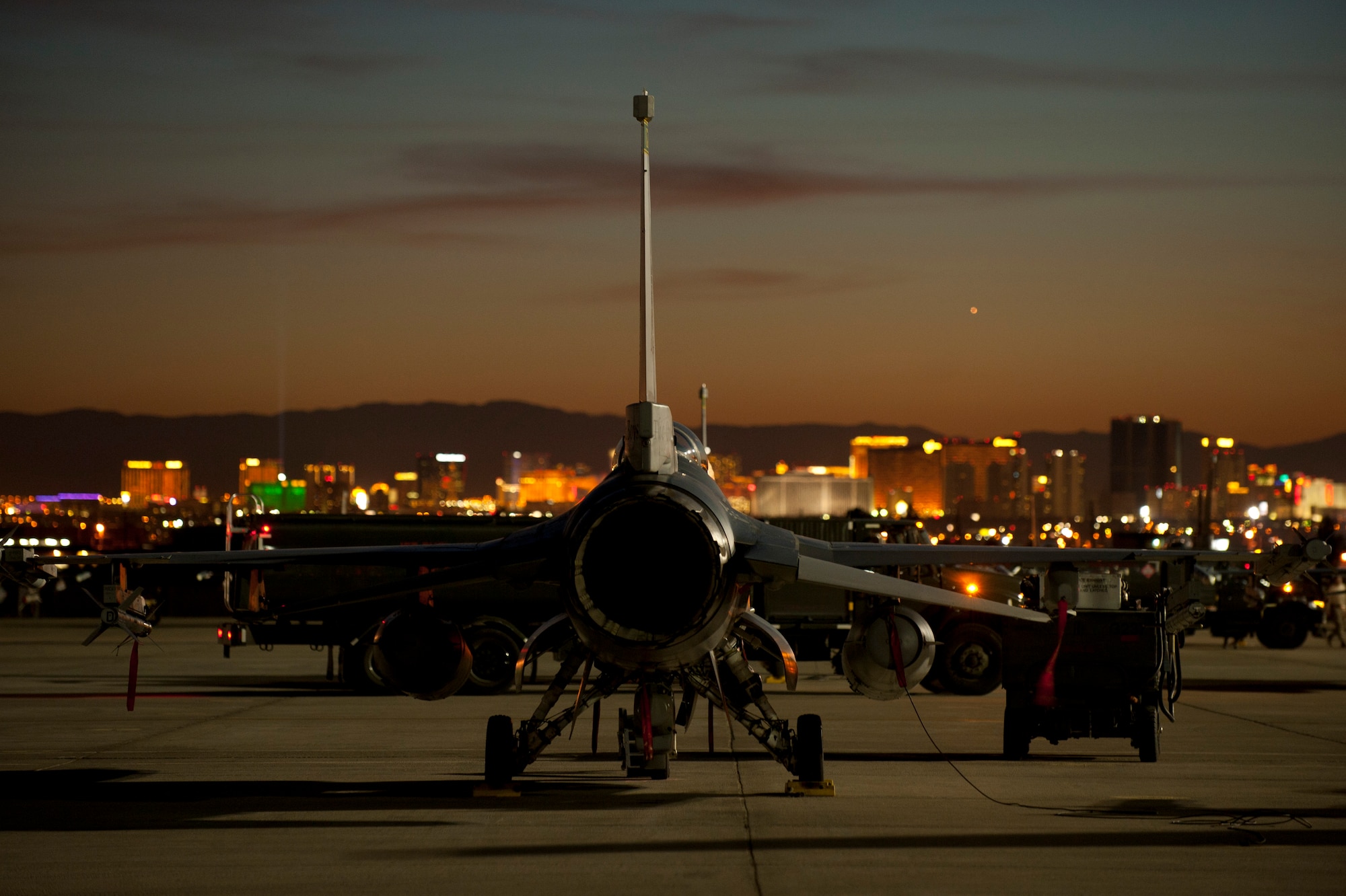 An F-16 Fighting Falcon assigned to the 134th Fighter Squadron, Burlington Air National Guard Base, Vt., stands ready on the flightline prior to playing part in a Red Flag 15-1 night training sortie at Nellis Air Force Base, Nev., Feb. 4, 2015. National Guard units have been a staple at Red Flag, where they have the opportunity to maintain the highest levels of proficiency while integrating with other U.S. and coalition operational units. (U.S. Air Force photo by Airman 1st Class Joshua Kleinholz)