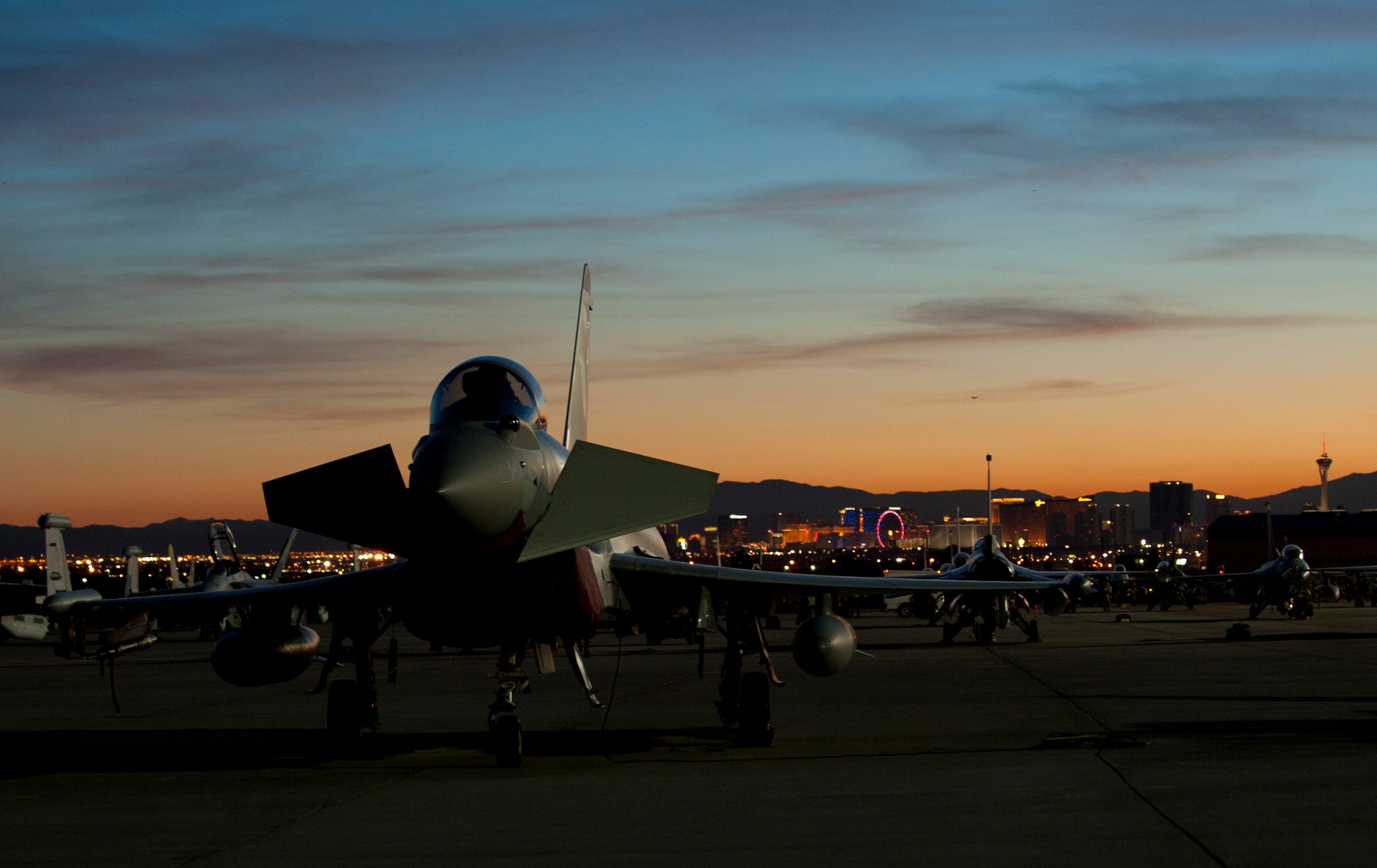 A Royal Air Force Typhoon FGR4 fighter assigned to 1 (Fighter) Squadron, RAF Lossiemouth, Scotland, stands ready on the flightline prior to playing part in a Red Flag 15-1 night training sortie at Nellis Air Force Base, Nev., Feb. 4, 2015. The RAF has participated in Red Flag exercises since the late 1970’s. (U.S. Air Force photo by Airman 1st Class Joshua Kleinholz)