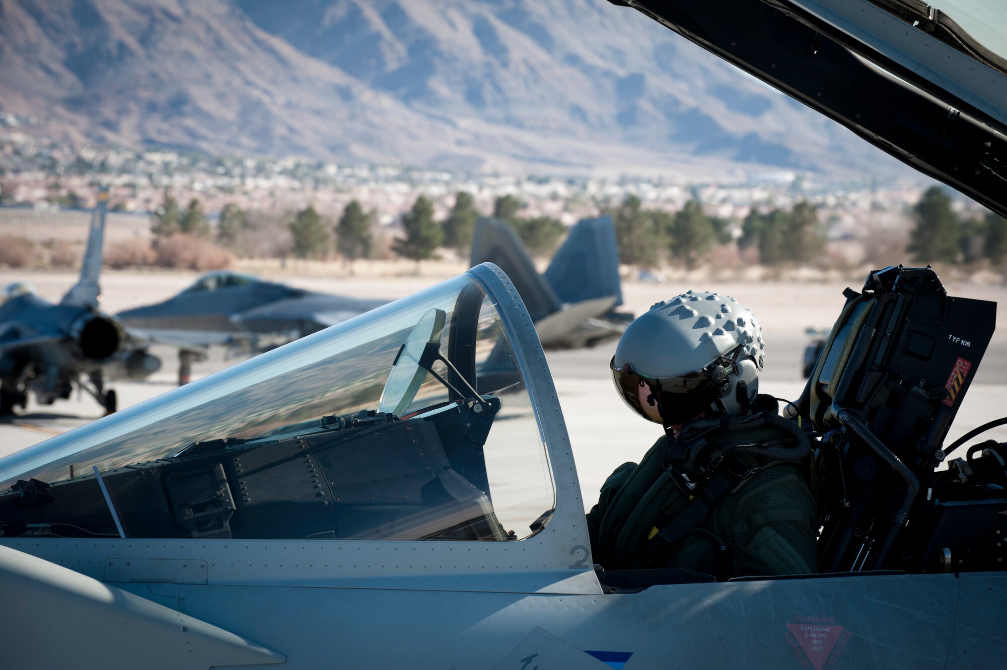 A Royal Air Force pilot assigned to 1 (Fighter) Squadron, RAF Lossiemouth, Scotland, performs pre-flight checks on his Typhoon FGR4 fighter prior to a Red Flag training sortie at Nellis Air Force Base, Nev., Feb. 2, 2015. During this iteration of Red Flag, Nellis AFB hosted the world’s oldest fighter unit. Britain’s No. 1 Squadron originally established in 1912. (U.S. Air Force photo by Airman 1st Class Joshua Kleinholz)