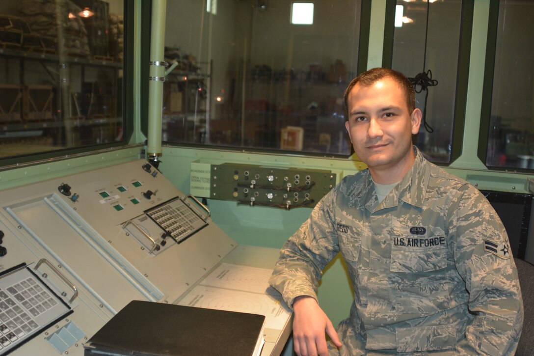 U.S. Air Force Airman 1st Class Jonathan Redd, an airfield systems specialist assigned to the 241st Air Traffic Control Squadron (ATCS), Missouri Air National Guard, performs an operations test on a mobile air traffic control tower at Rosecrans Air National Guard Base, St. Joseph, Mo., Feb. 11, 2015. Redd is preparing for an inspection at the 241st ATCS later this year. (U.S. Air National Guard photo by Tech. Sgt. Michael Crane/Released)