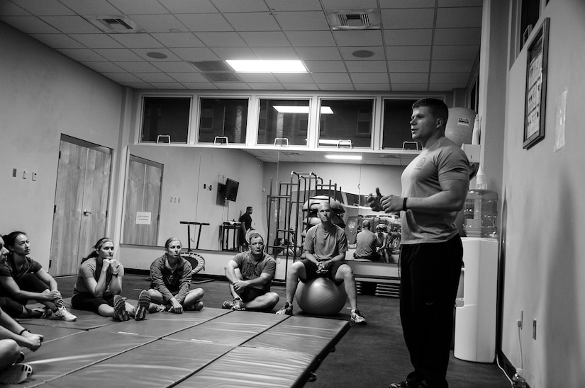 U.S. Air Force Staff Sgt. Dayne Tosi, Survival, Evasion, Resistance and Escape Specialist assigned to Joint Task Force-Bravo operations cell, goes over the basic concept of self-defense to a class of ten students on Soto Cano Air Base, Honduras, Feb. 10, 2015.  The self-defense class was held to teach personnel assigned to JTF-Bravo about the importance of using self-defense to escape a violent situation. (U.S. Air Force photo/Tech. Sgt. Heather Redman)