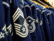 Malmstrom Air Force Base Honor Guard uniforms hang in a uniform closet. Uniforms are issued to honor guardsmen on the first day the members start their contract. The trainers and more experiences honor guardsmen help the new members prepare their ceremonial uniforms. (U.S. Air Force photo/Staff Sgt. Delia Marchick)
