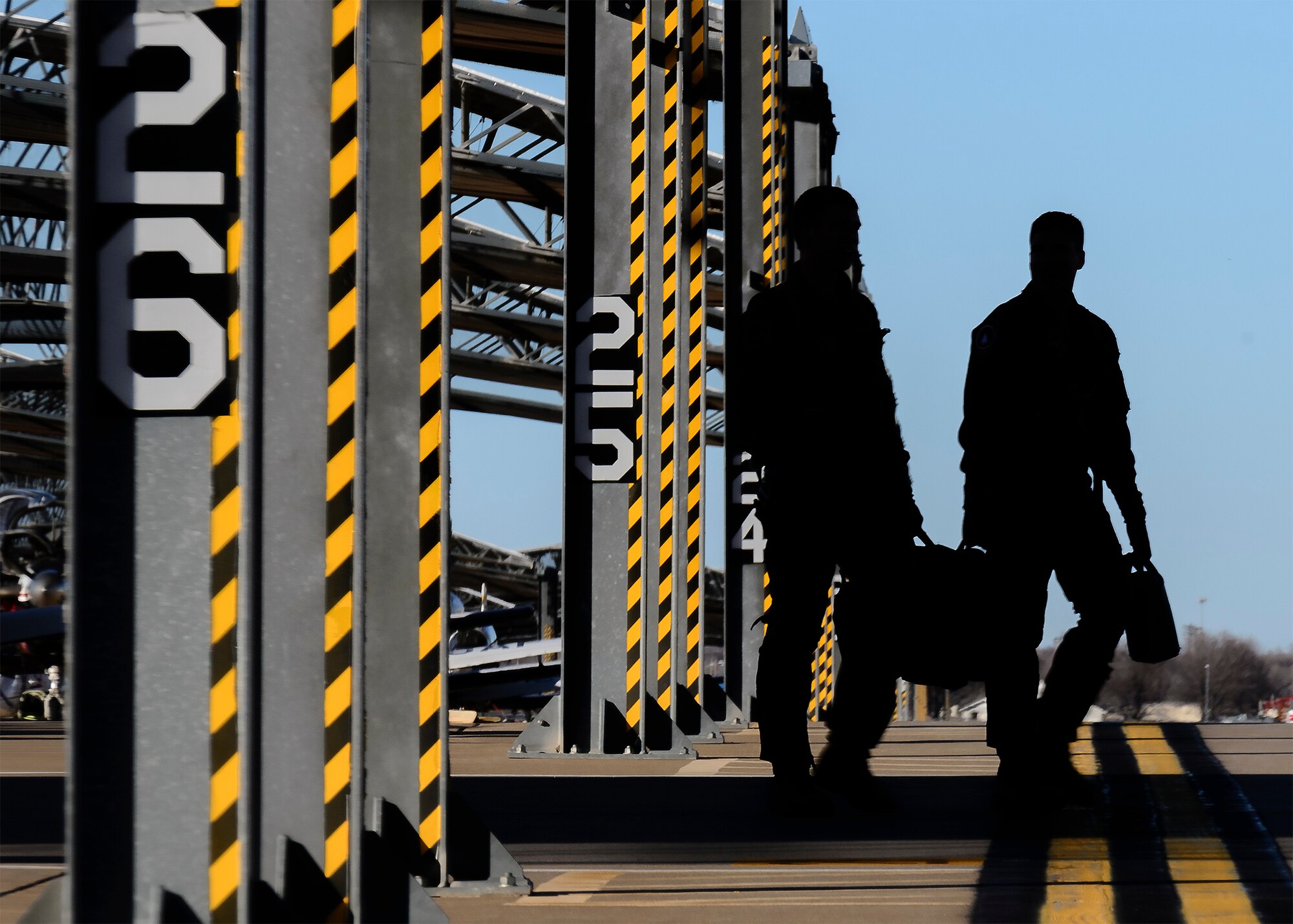 VANCE AIR FORCE BASE, Okla. -- A Joint Specialized Undergraduate Pilot Training student and his instructor return from their T-6A Texan II sortie Jan. 26. Since 1941, Vance has awarded almost 33,000 pilot wings to military aviators. (U.S. Air Force photo / David Poe)